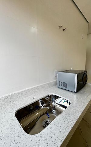 Casa de condomínio à venda com 100m², 3 quartos e 2 vagas Casa de condomínio à venda com 100m², 3 quartos e 2 vagasCozinha