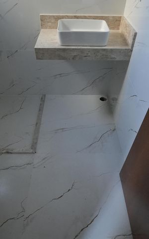 Casa à venda com 96m², 3 quartos e 2 vagasBanheiro da Suíte