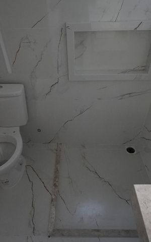Casa à venda com 96m², 3 quartos e 2 vagasBanheiro da Suíte