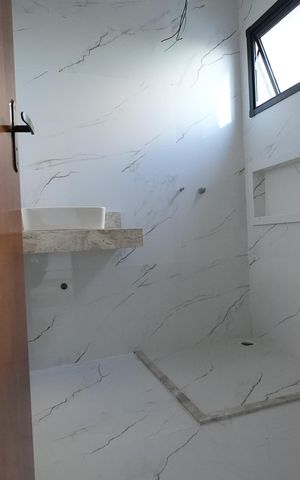 Casa à venda com 96m², 3 quartos e 2 vagasBanheiro da Suíte