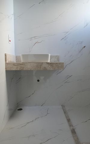 Casa à venda com 96m², 3 quartos e 2 vagasBanheiro da Suíte