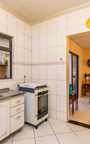 Casa à venda com 146m², 3 quartos e 2 vagas Casa à venda com 146m², 3 quartos e 2 vagasCozinha