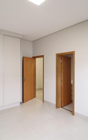 Casa de condomínio para alugar com 238m², 3 quartos e 2 vagasQuarto 2 - Suíte