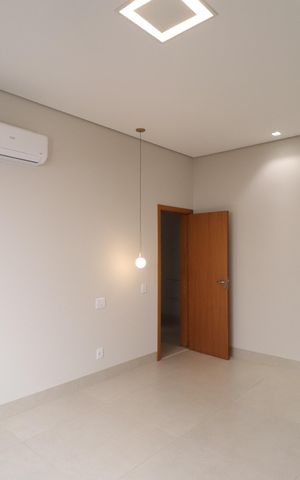 Casa de condomínio para alugar com 238m², 3 quartos e 2 vagasQuarto 1 - Suíte