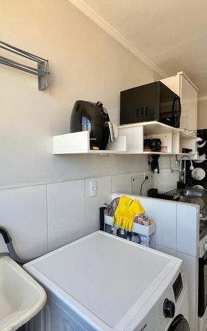 Apartamento à venda com 40m², 2 quartos e 1 vaga Apartamento à venda com 40m², 2 quartos e 1 vagaCozinha e Área de Serviço