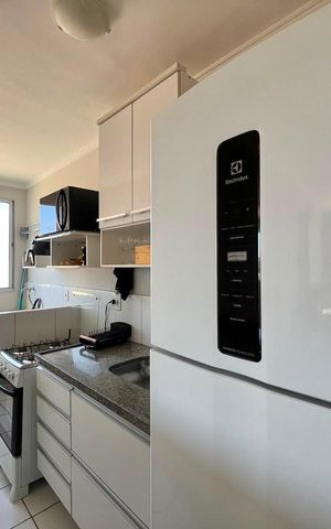 Apartamento à venda com 40m², 2 quartos e 1 vaga Apartamento à venda com 40m², 2 quartos e 1 vagaCozinha e Área de Serviço