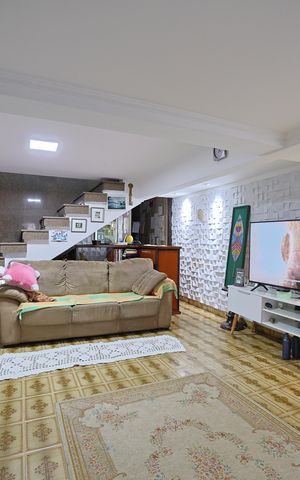 Casa à venda com 125m², 3 quartos e 2 vagasSala de TV