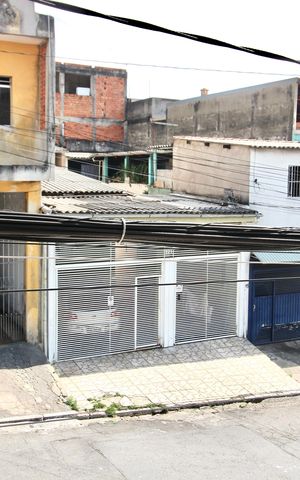 Casa à venda com 400m², 3 quartos e 2 vagas Casa à venda com 400m², 3 quartos e 2 vagasFachada