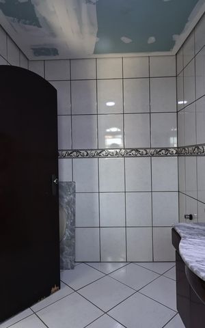 Casa à venda com 225m², 3 quartos e 5 vagas Casa à venda com 225m², 3 quartos e 5 vagasBanheiro da Suíte 1