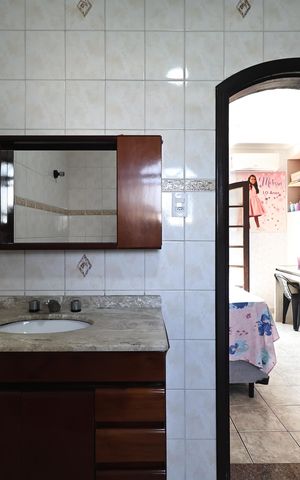 Casa à venda com 225m², 3 quartos e 5 vagas Casa à venda com 225m², 3 quartos e 5 vagasBanheiro da Suíte 2
