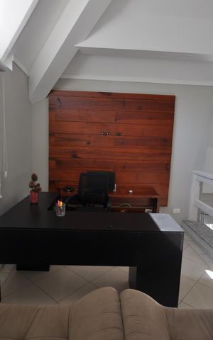 Casa à venda com 590m², 4 quartos e 3 vagasSala de TV