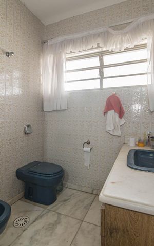 Casa à venda com 449m², 5 quartos e 4 vagasBanheiro Social