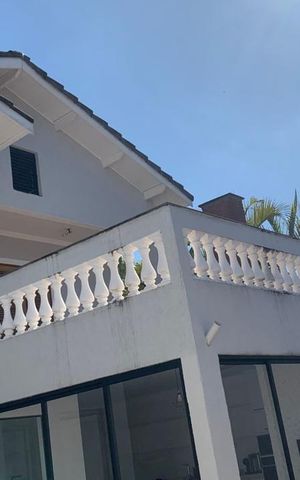Casa à venda com 420m², 4 quartos e 5 vagas Casa à venda com 420m², 4 quartos e 5 vagasFachada