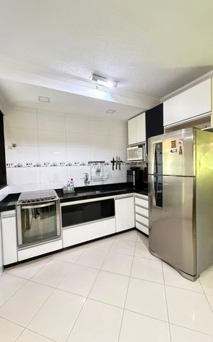 Casa de condomínio à venda com 77m², 2 quartos e 1 vaga Casa de condomínio à venda com 77m², 2 quartos e 1 vagaCozinha e Área de Serviço