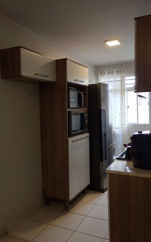 Apartamento à venda com 44m², 2 quartos e 1 vaga Apartamento à venda com 44m², 2 quartos e 1 vagaCozinha e Área de Serviço