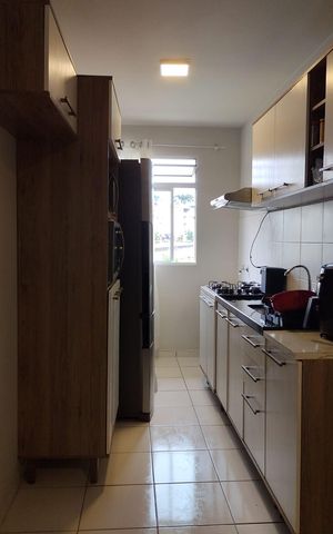 Apartamento à venda com 44m², 2 quartos e 1 vaga Apartamento à venda com 44m², 2 quartos e 1 vagaCozinha e Área de Serviço