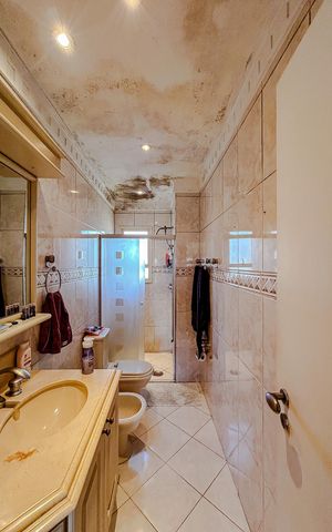 Apartamento à venda com 128m², 4 quartos e 3 vagasBanheiro da Suíte 1