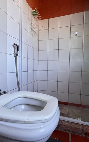 Casa de condomínio para alugar com 490m², 4 quartos e 2 vagasBanheiro Social