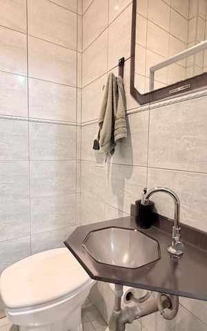 Casa à venda com 364m², 7 quartos e 2 vagasBanheiro da Suíte 1