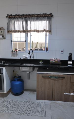 Casa à venda com 125m², 2 quartos e 2 vagasCozinha