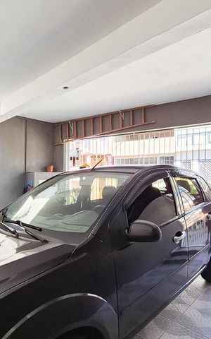 Casa à venda com 145m², 3 quartos e 2 vagas Casa à venda com 145m², 3 quartos e 2 vagasGaragem