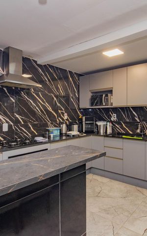 Casa à venda com 120m², 3 quartos e 4 vagas Casa à venda com 120m², 3 quartos e 4 vagasCozinha