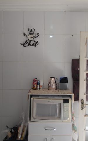 Casa de condomínio para alugar com 140m², 4 quartos e 2 vagasCozinha