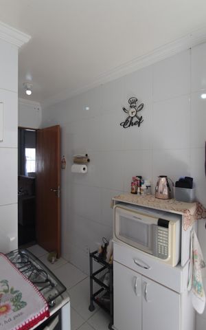 Casa de condomínio para alugar com 140m², 4 quartos e 2 vagasCozinha