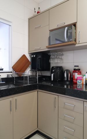 Casa para alugar com 70m², 3 quartos e 2 vagasCozinha