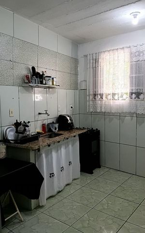 Casa à venda com 120m², 3 quartos e sem vaga Casa à venda com 120m², 3 quartos e sem vagaCozinha