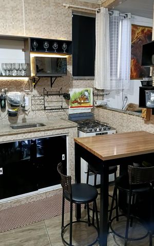Casa à venda com 120m², 3 quartos e sem vaga Casa à venda com 120m², 3 quartos e sem vagaCozinha