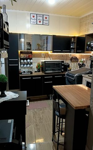 Casa à venda com 120m², 3 quartos e sem vaga Casa à venda com 120m², 3 quartos e sem vagaCozinha