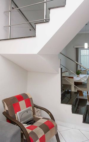 Casa à venda com 86m², 3 quartos e 1 vagaSala de TV