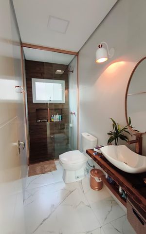 Casa à venda com 312m², 5 quartos e 6 vagasBanheiro