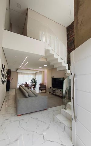 Casa à venda com 312m², 5 quartos e 6 vagasSala