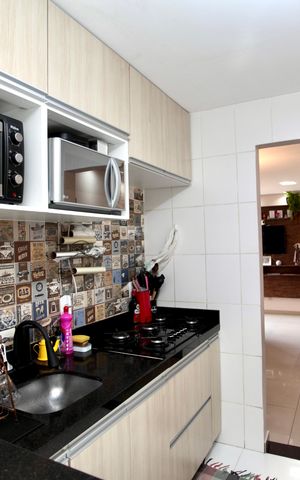 Apartamento à venda com 50m², 2 quartos e 1 vaga Apartamento à venda com 50m², 2 quartos e 1 vagaCozinha e Área de Serviço