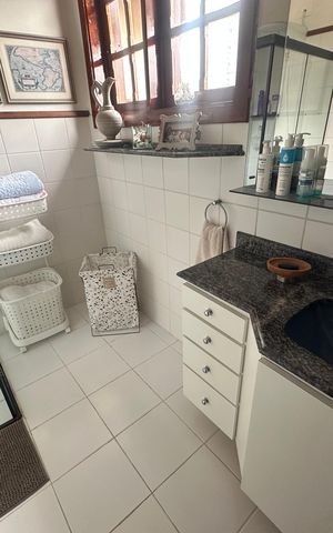 Casa de condomínio para alugar com 463m², 2 quartos e 4 vagasBanheiro da Suíte 1