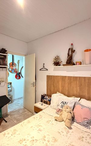 Casa à venda com 60m², 2 quartos e 2 vagasQuarto 2