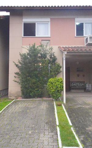 Casa de condomínio para alugar com 126m², 3 quartos e 2 vagasFachada da casa