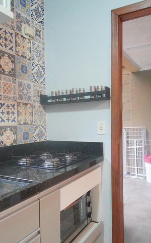 Casa de condomínio para alugar com 126m², 3 quartos e 2 vagasCozinha