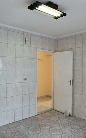 Casa à venda com 154m², 2 quartos e 4 vagas Casa à venda com 154m², 2 quartos e 4 vagasCozinha
