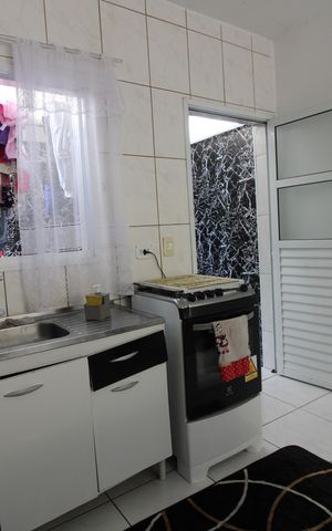 Casa de condomínio à venda com 54m², 2 quartos e 1 vagacozinha