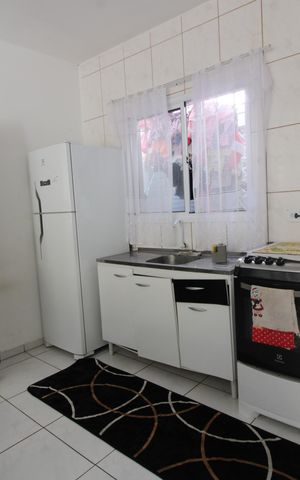 Casa de condomínio à venda com 54m², 2 quartos e 1 vagacozinha