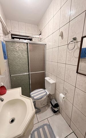 Casa à venda com 125m², 2 quartos e 3 vagasBanheiro da Suíte 1