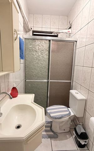 Casa à venda com 125m², 2 quartos e 3 vagasBanheiro da Suíte 1