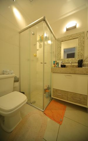 Casa de condomínio à venda com 115m², 4 quartos e 2 vagasSuíte - Banheiro 