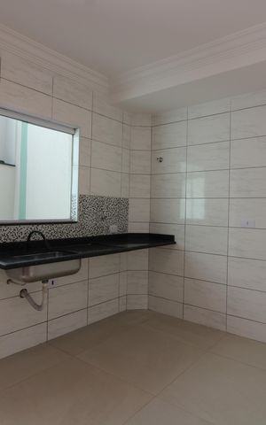 Casa à venda com 73m², 2 quartos e 2 vagascozinha