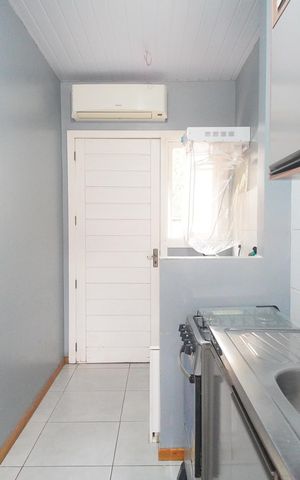 Casa de condomínio à venda com 48m², 2 quartos e 2 vagasCozinha