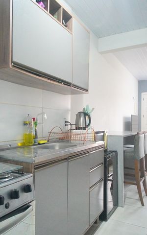Casa de condomínio à venda com 48m², 2 quartos e 2 vagasCozinha