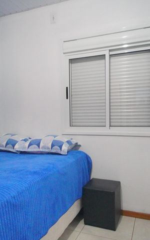 Casa de condomínio à venda com 48m², 2 quartos e 2 vagasQuarto 1